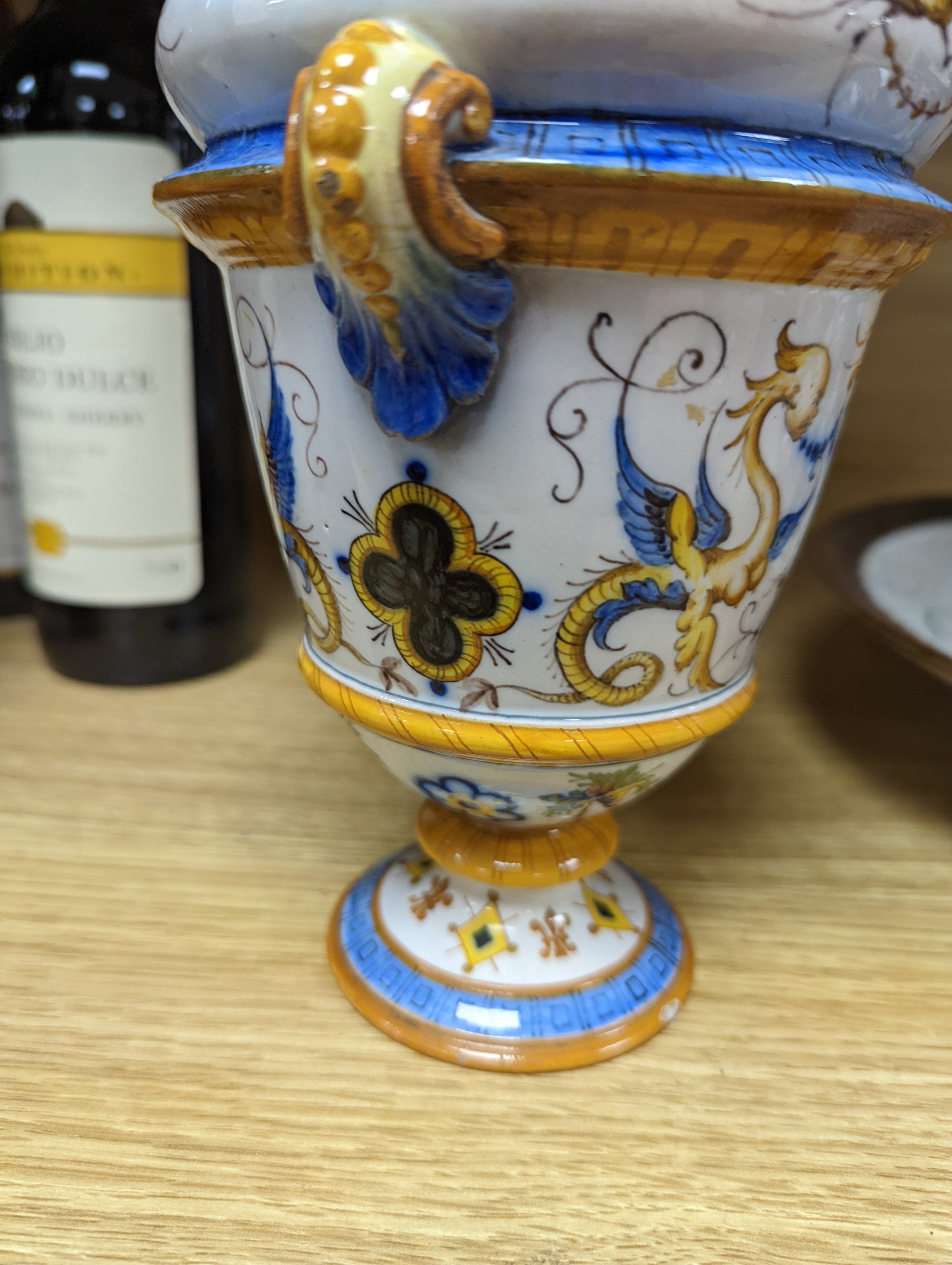 A Ginori maiolica two handled vase and Delft polychrome double cylinder teapot 27cm